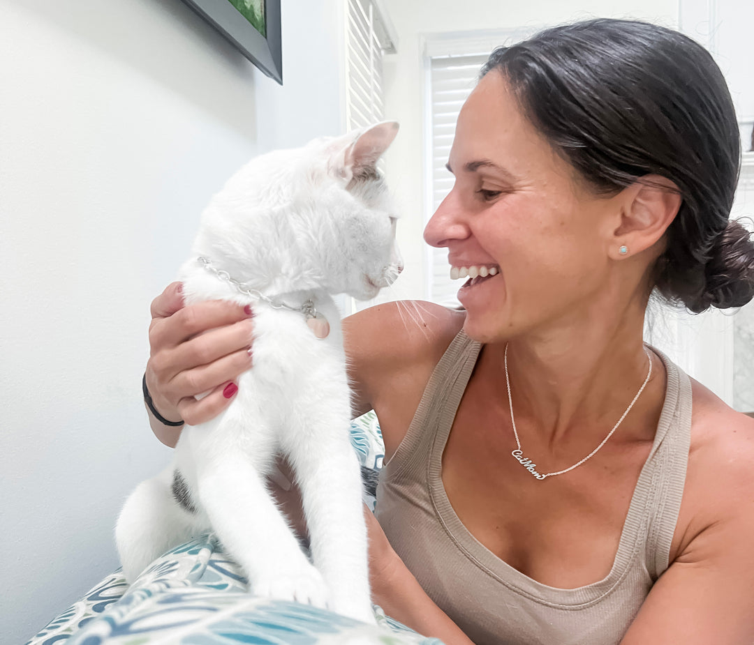 Erica Sara wearing Cat Mom necklace and her cat